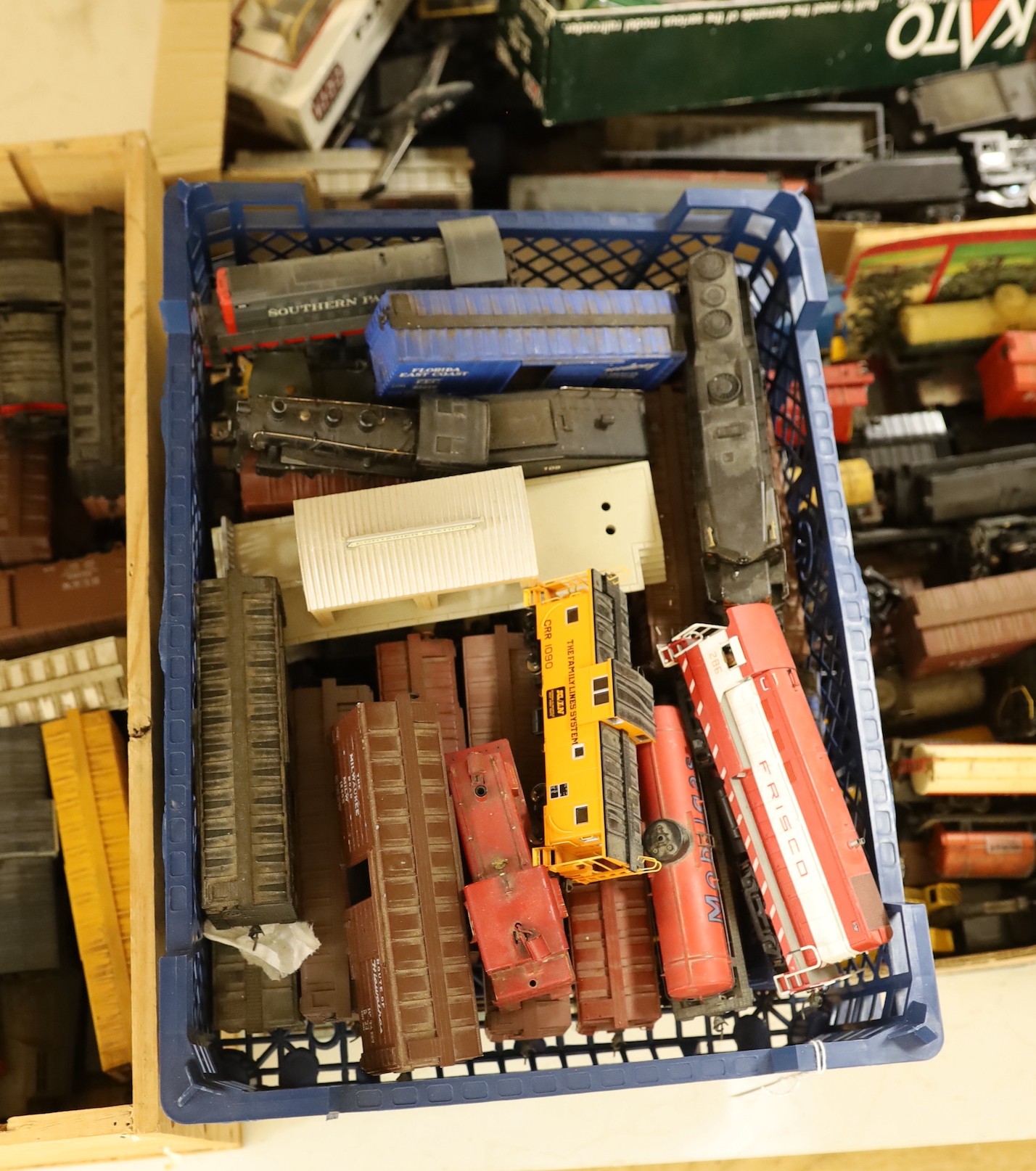 A large collection of 00 gauge toy locomotives and rolling stock